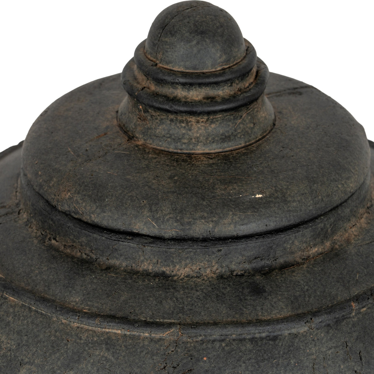 Close-up of the domed lid and rounded finial on the Hill Interiors medium ceramic pot in matte black with a weathered finish.