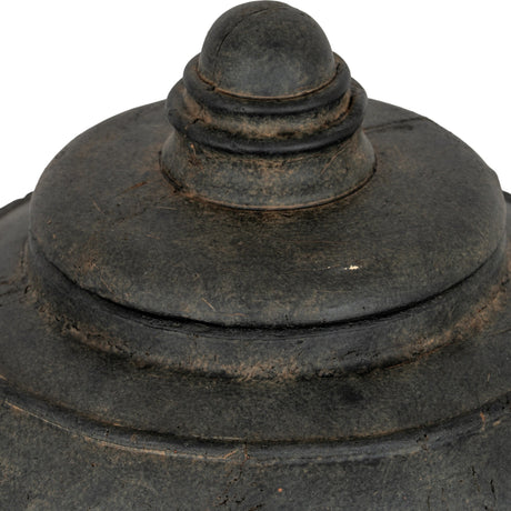 Close-up of the domed lid and rounded finial on the Hill Interiors medium ceramic pot in matte black with a weathered finish.