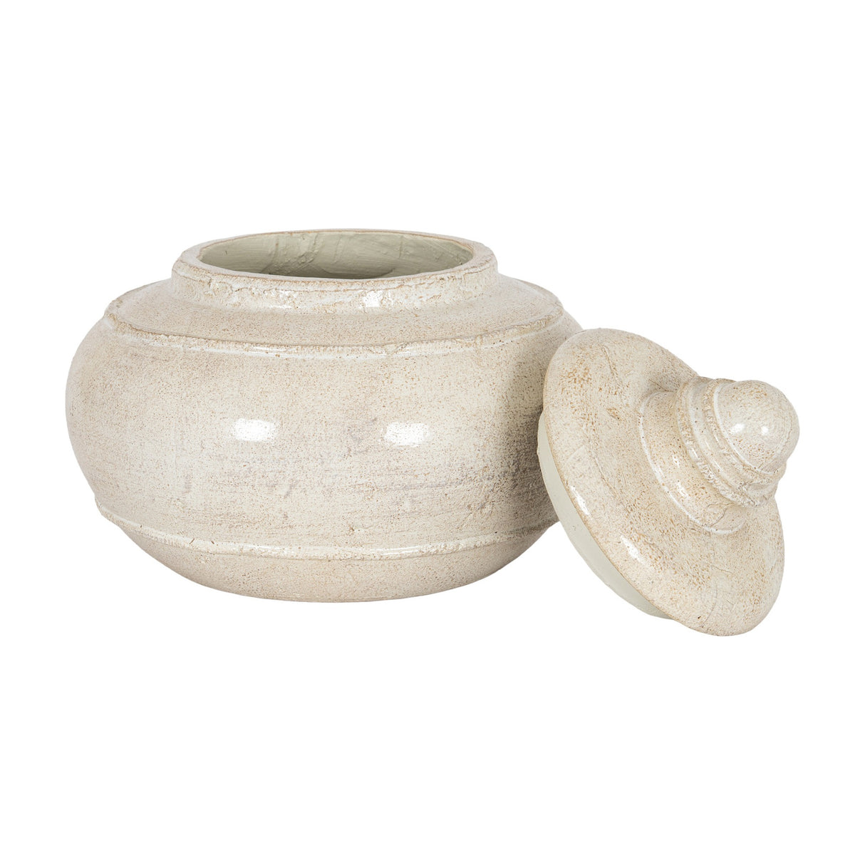 Hill Interiors large white ceramic storage pot with rounded body and domed lid tilted beside it, shown on a plain white background.