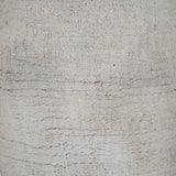 Close-up of the Hill Interiors Large Ceramic Vase in cream, showing the soft matte finish and subtle dark speckled texture across the rounded body.
