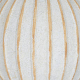Close-up of Hill Interiors Small Round Ceramic Ball Vase in white with a speckled glaze and vertical tan stripes across the rounded body.