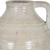 Close-up of the Hill Interiors Medium Ceramic Jug in white, showing the rim, angular handle and softly weathered glaze over a rounded body.