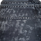 Close-up of Hill Interiors Etched Tall Ceramic Vase in black, showing textured banded surface with cross-stitch detailing and matte glaze finish.