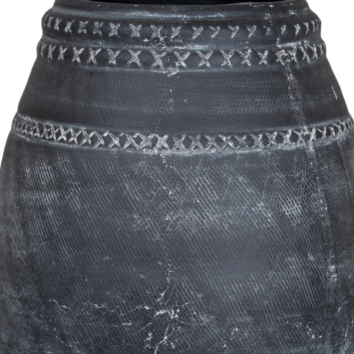 Close-up of Hill Interiors Etched Ceramic Vase in matte black, showing textured surface and cross-stitch etched banding around the rounded body.
