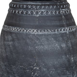 Close-up of Hill Interiors Etched Ceramic Vase in matte black, showing textured surface and cross-stitch etched banding around the rounded body.