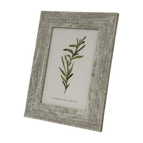Hill Interiors Wooden Photo Frame 4x6 in a distressed white finish, displayed upright at an angle with a botanical print insert on a plain white background.
