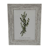 Hill Interiors wooden 5x7 photo frame with a distressed white and grey paint finish, displaying a green botanical print on a plain background.