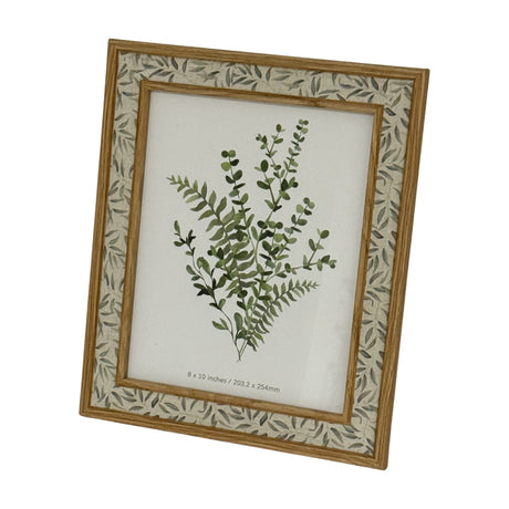 Hill Interiors wooden 8x10 photo frame in brown with a leaf-patterned inner border, displayed on a plain white background.