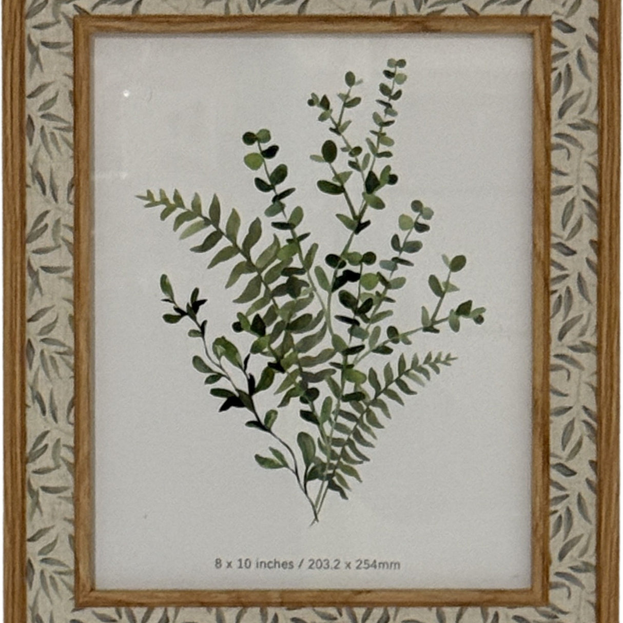 Hill Interiors wooden 8x10 photo frame with brown inner border and outer surround featuring a soft green leaf pattern on a cream background.