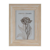 Hill Interiors wooden 4x6 photo frame in soft white painted finish with visible grain, displaying a floral line-art insert, on a plain white background.