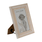 Hill Interiors wooden 5x7 photo frame in white with a slim moulded profile, shown angled with kickstand support against a plain white background.