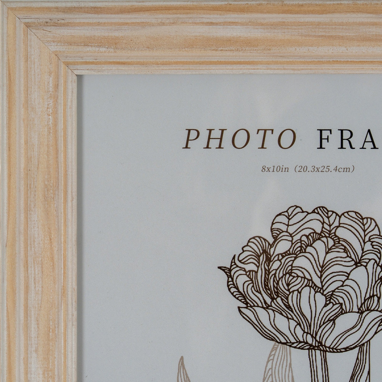 Hill Interiors 8x10 wooden photo frame with a white washed finish and gently profiled edge, shown in close-up on the top left corner.