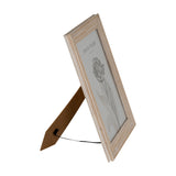 Hill Interiors wooden 8x10 photo frame in white with profiled edge, shown from the side with kraft easel back extended on a plain white background.