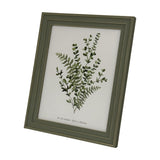Hill Interiors 8x10 wooden photo frame in soft grey with a moulded profile, displaying a botanical print, shown at an angle on a white background.