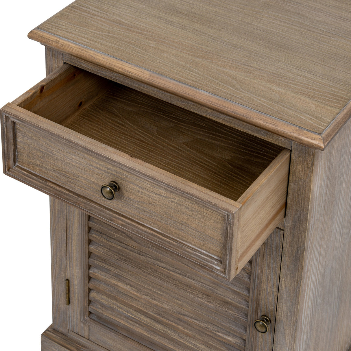 Close-up of the Hill Interiors brown wood bedside chest showing the open top drawer with brass knob above the louvred left-hand door.