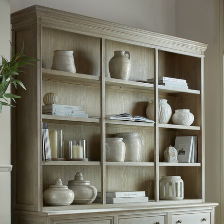 Hill Interiors Wooden Three-Shelf Dresser Top in brown, styled with ceramic vases, books and candles above a base cabinet in a dining setting.