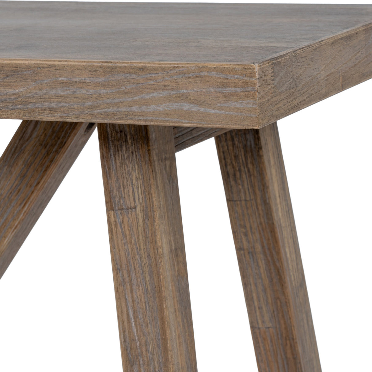 Close-up of Hill Interiors Wooden Console Table in brown, showing the tapered legs and grained timber edge of the rectangular top against a white background.