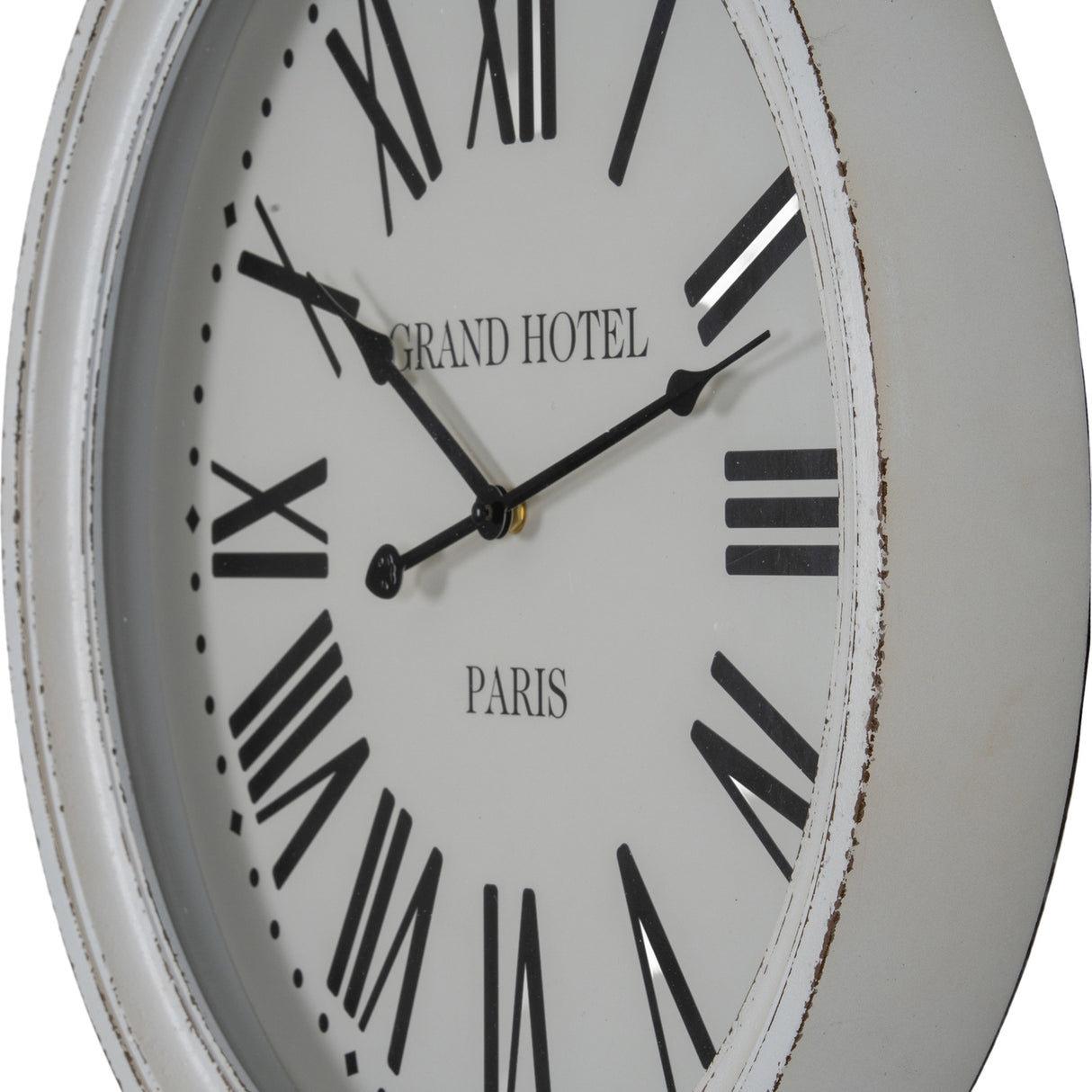 Hill Interiors Round Glass-Fronted Wall Clock in white with wooden frame, black Roman numerals, and Grand Hotel Paris text, shown at an angle.