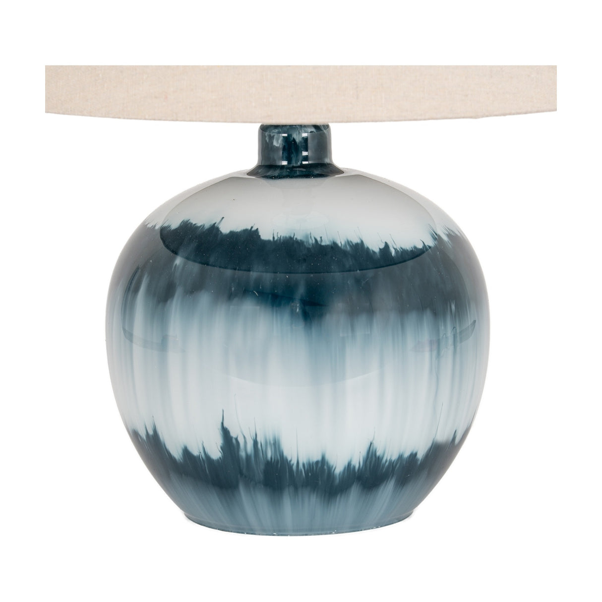 Hill Interiors Squat Glass Table Lamp base in rounded blue moulded glass with watery tonal variation, topped with a natural linen drum shade.