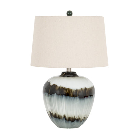 Hill Interiors table lamp with a rounded black and white glazed glass base and tapered natural linen shade, shown on a plain white background.