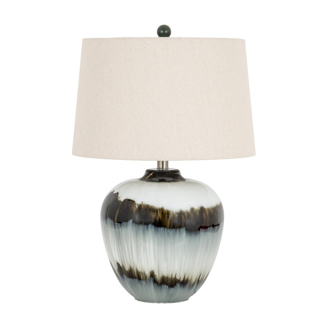Hill Interiors table lamp with a rounded black and white glazed glass base and tapered natural linen shade, shown on a plain white background.