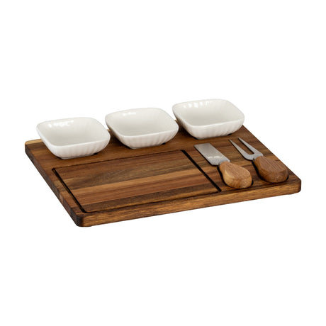 Hill Interiors acacia wood cheese board set with three square white ceramic bowls and two wooden-handled cutlery pieces on a plain background.
