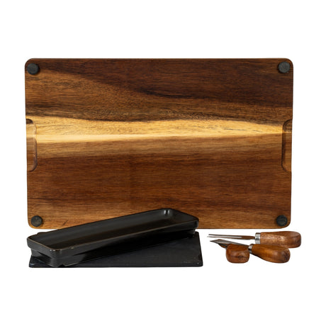 Hill Interiors acacia wood cheese board set shown with black rectangular bowl, grey slate panel and three wooden-handled cutlery pieces on a white background.