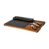 Hill Interiors acacia cheese board set with grey slate panel, black rectangular bowl and three wood-handled cutlery pieces on a white background.