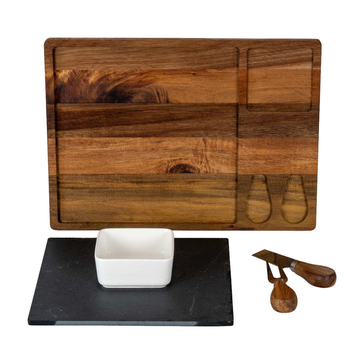 Hill Interiors acacia cheese board set with recessed slate insert, square white ceramic bowl and two wood-handled cheese knives on a white background.