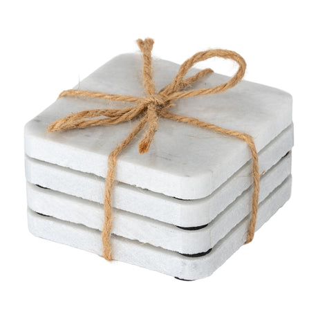 Hill Interiors set of four square white marble coasters with soft grey veining, stacked and tied with jute twine bow on a plain white background.