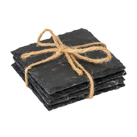 Hill Interiors set of four square black slate coasters stacked and tied with jute twine bow on a plain white background.