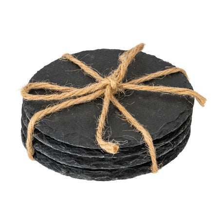 Hill Interiors set of four round black slate coasters stacked and tied with jute twine in a bow, shown on a plain white background.