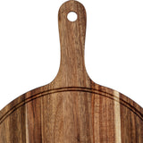 Hill Interiors round acacia serving board in brown with a paddle handle and hanging hole, showing natural grain, on a plain white background.