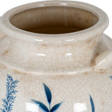 Close-up of the Hill Interiors Blue Flora Amphora ceramic vase showing its crackle-glazed cream neck, curved handle and blue leaf motif.