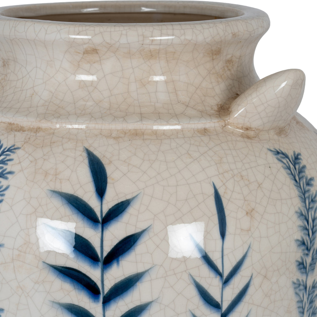 Close-up of the Hill Interiors Blue Flora Amphora ceramic vase showing its crackle-glazed cream neck, curved handle and hand-painted blue leaf motif.