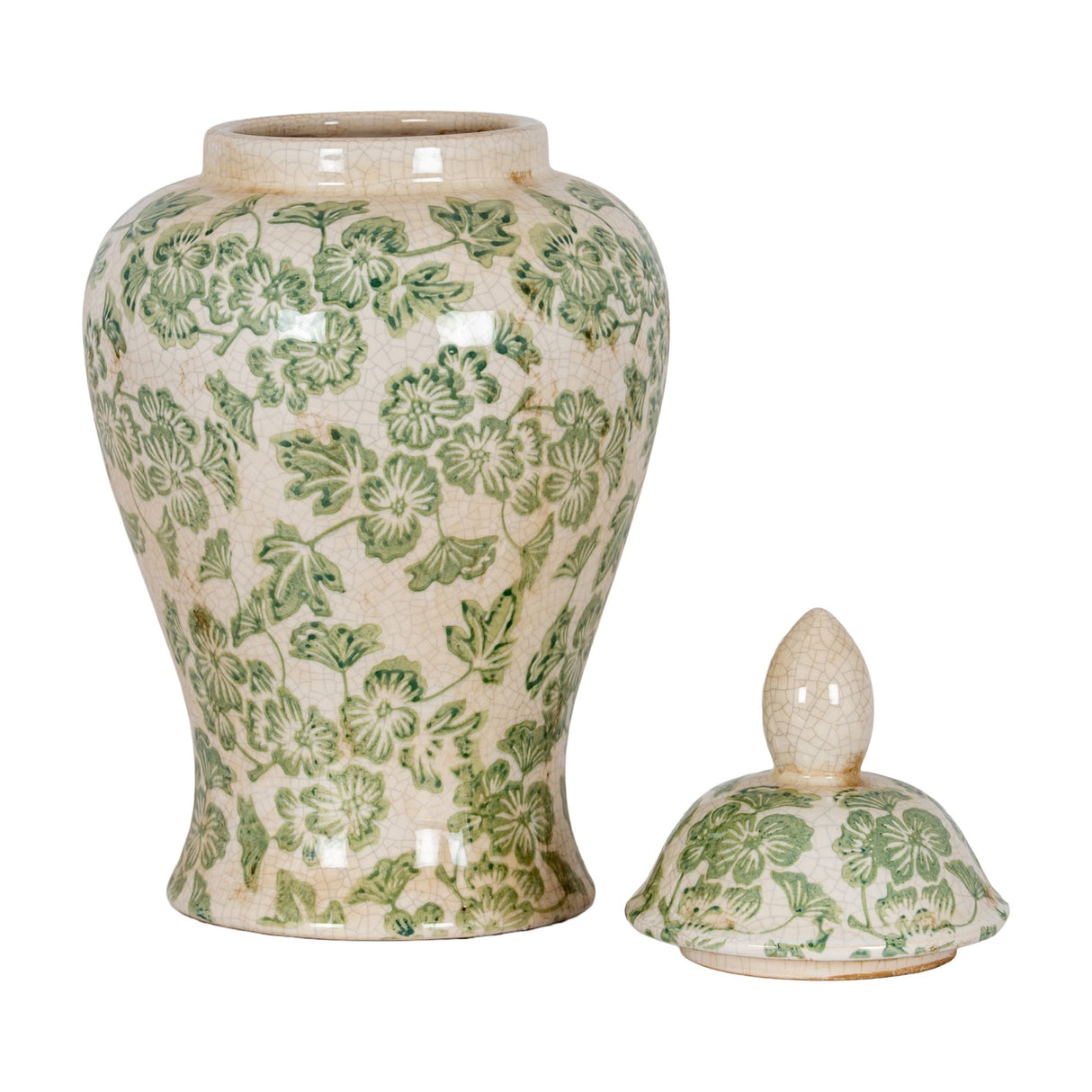 Hill Interiors ceramic ginger jar in cream with green clover motif, domed lid lifted to the side, shown on a plain white background.