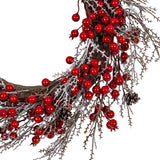 Close-up of Hill Interiors Winter Wreath with Red Berries showing glossy red berry clusters, frosted twigs and small pinecones on a white background.