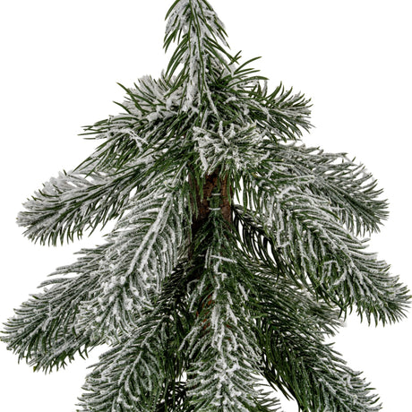 Close-up of Hill Interiors Small Snowy Pine Tree showing layered green plastic branches with a white snowy dusting around the central trunk.