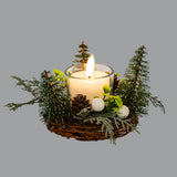 Hill Interiors Small Brush Tree Candle Wreath with Pinecones in green, twig base with mini fir trees and pinecones around a lit pillar candle.