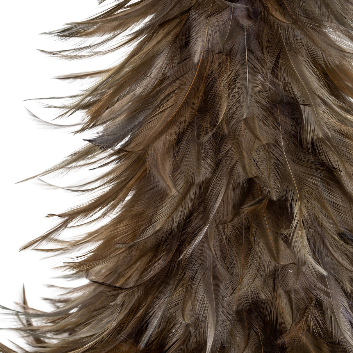 Close-up of Hill Interiors Small Fawn Feather Tree in brown, showing layered natural feathers in warm tawny tones against a plain white background.
