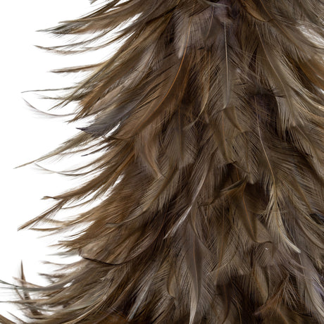 Close-up of Hill Interiors Small Fawn Feather Tree in brown, showing layered natural feathers in warm tawny tones against a plain white background.