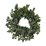 Hill Interiors Woodland Pine faux garland shaped into a ring of deep green needled sprigs with small pinecones tucked among the foliage, on a white background.