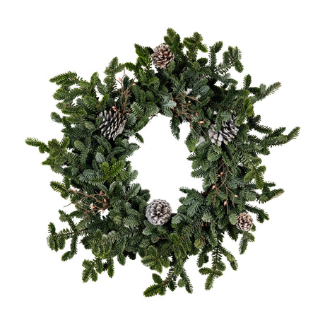 Hill Interiors Woodland Pine Wreath with Cones in green faux plastic foliage with frosted cones on a plain white background.