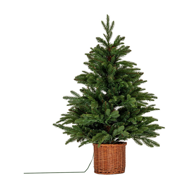 Hill Interiors Pre-Lit LED Fir Tree in a woven rattan pot, 90cm green faux fir with layered branches and trailing cable, on a white background.