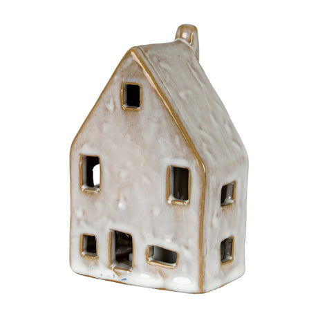 Hill Interiors ceramic LED house in matte white with pitched roof, chimney and cut-out windows, shown on a plain white background.