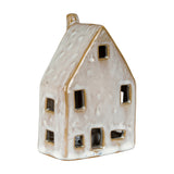 Hill Interiors ceramic LED house in matte white with pitched roof, chimney and cut-out square windows, shown against a plain white background.