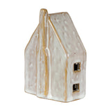 Hill Interiors ceramic LED house in white with matte chalky finish, pitched roof, chimney and cut-out square windows, shown side-on against a plain background.