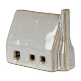 Hill Interiors Ceramic Barn with LED Light in white glaze, showing pitched roof, tall chimney and three small square window openings, on a plain background.