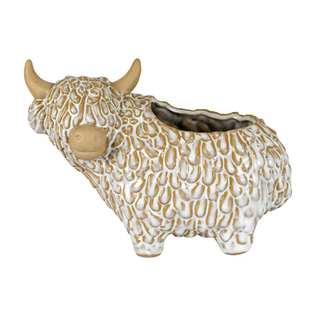 Hill Interiors ceramic Highland cow planter in white with a textured shaggy coat, tan horns and muzzle, head turned left, on a plain background.