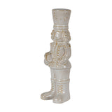 Hill Interiors Ceramic Nutcracker with Drum in white glaze, shown from the side with tall hat, moustache and lace-up boots against a plain background.